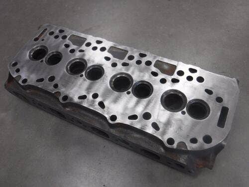 404283 | Cylinder Head | Ford 5610 5610S 5640 6610 6640 7100 7740 9030 | New Holland TB100 TB110 TS100 TS110 |  | 87802121 | 87802940 | 81876753 | 87802120 | 87802939 | E9NN6090AAD | E9NN6090AE