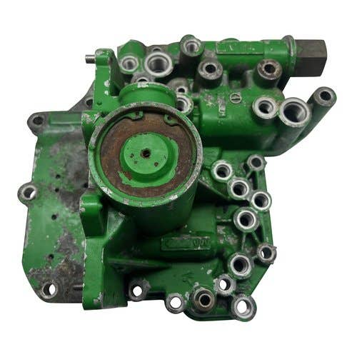 410220 | Transmission Control Vave Housing | John Deere 4650 |  | RE14031