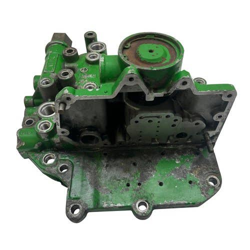 410220 | Transmission Control Vave Housing | John Deere 4650 |  | RE14031