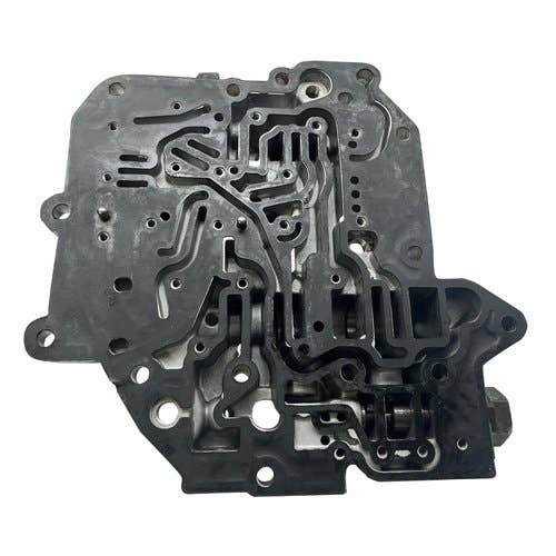 410220 | Transmission Control Vave Housing | John Deere 4650 |  | RE14031
