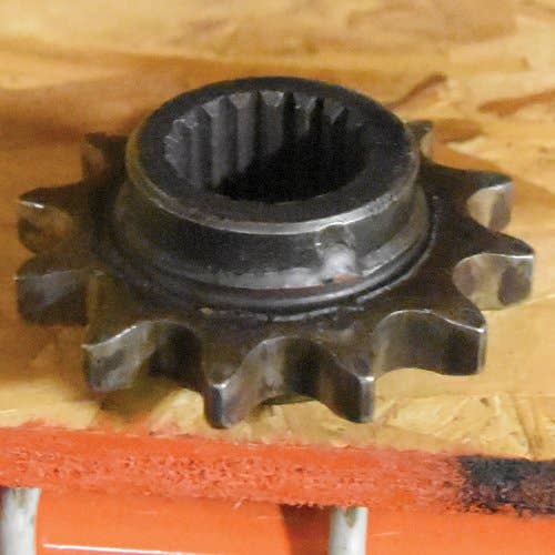 432056 | Tensioner Sprocket | New Holland L225 L325 L425 L445 |  | 249635