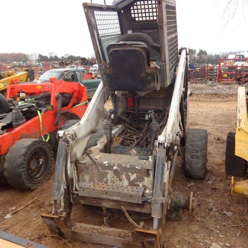 1999 Used Bobcat 873 Skid Steer Loader parts.
