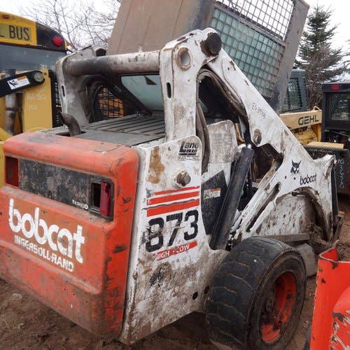 1999 Used Bobcat 873 Skid Steer Loader parts.
