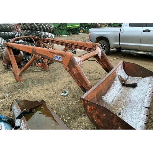 Used Dual 300 Loader / Backhoe Attachments parts.