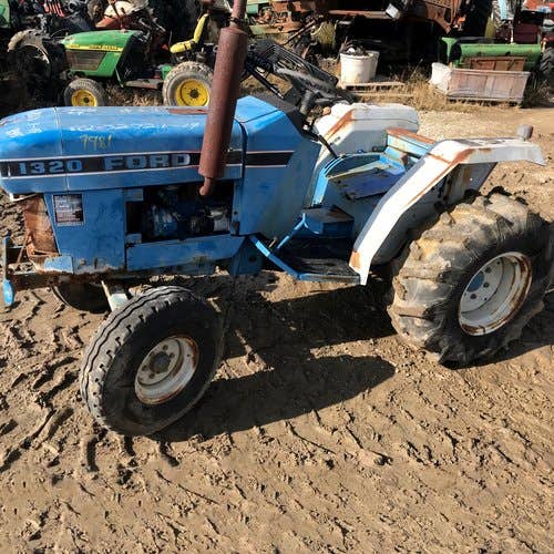 Used Ford 1320 Tractor parts.