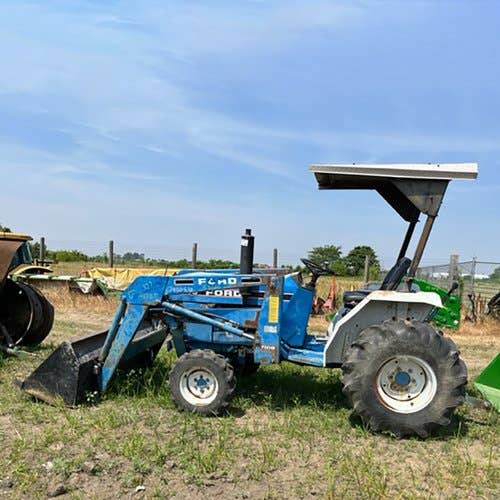 Used Ford 1320 Tractor parts.