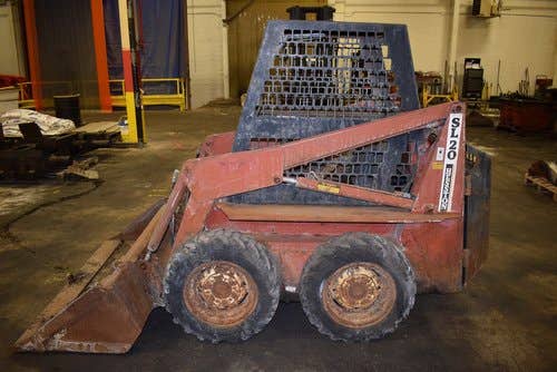 Used Hesston SL20 Skid Steer Loader parts.