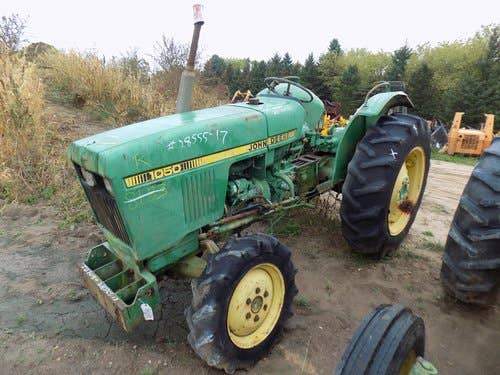 Used John Deere 1050 Tractor parts.