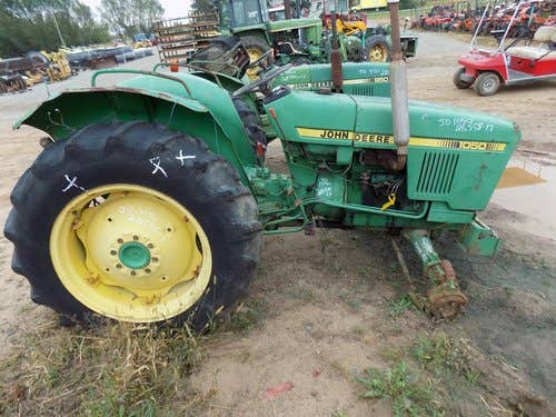 Used John Deere 1050 Tractor parts.