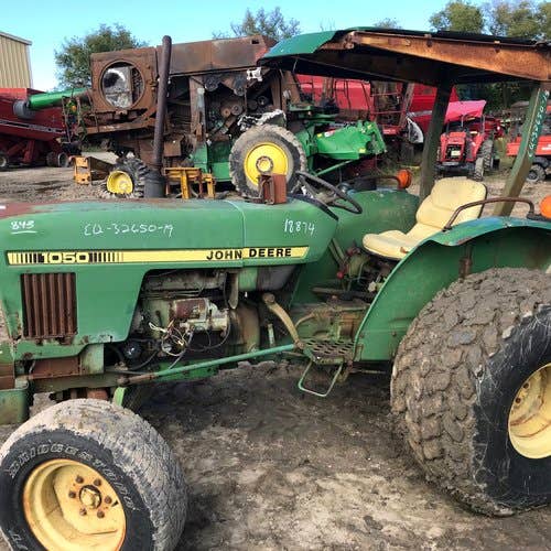 Used John Deere 1050 Tractor parts.