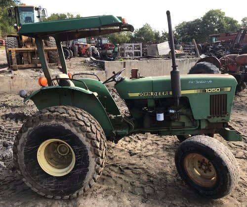 Used John Deere 1050 Tractor parts.