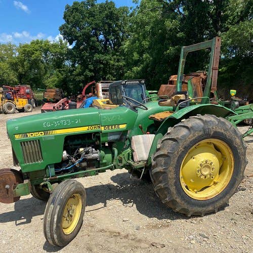 Used John Deere 1050 Tractor parts.
