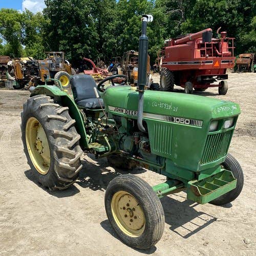 Used John Deere 1050 Tractor parts.