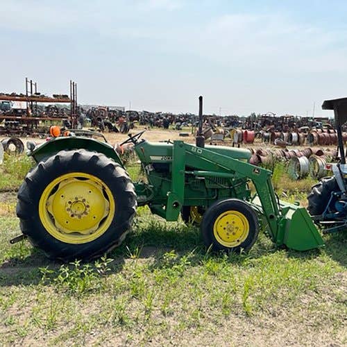 Used John Deere 1050 Tractor parts.