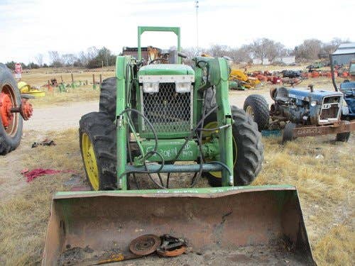 Used John Deere 1450 Tractor parts.