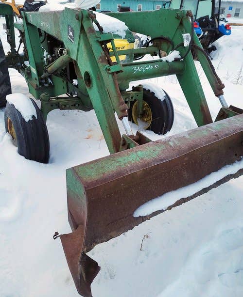 Used John Deere 146 Loader / Backhoe Attachments parts.