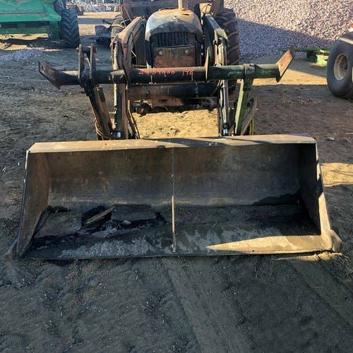 Used John Deere 148 Loader / Backhoe Attachments parts.