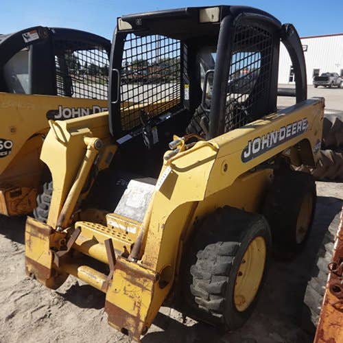 Used John Deere 240 Skid Steer Loader parts.