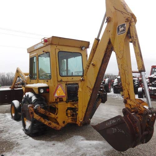 Used John Deere 310A Backhoe Loader parts.
