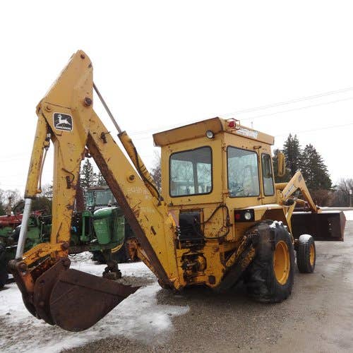 Used John Deere 310A Backhoe Loader parts.