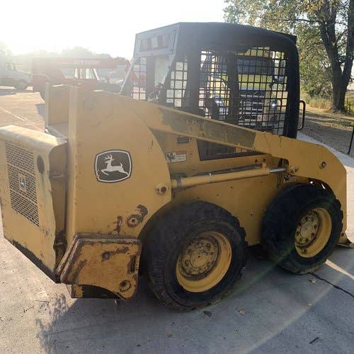 Used John Deere 315 Skid Steer Loader parts.