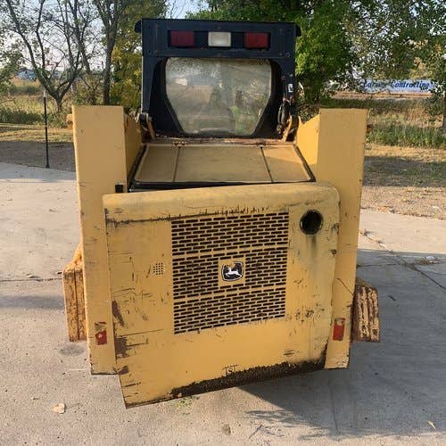 Used John Deere 315 Skid Steer Loader parts.