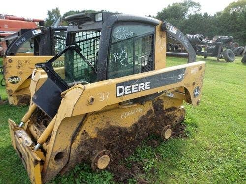Used John Deere 317 Skid Steer Loader parts.
