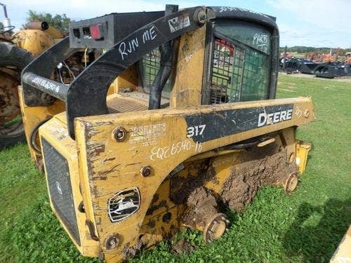 Used John Deere 317 Skid Steer Loader parts.