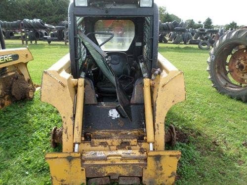 Used John Deere 317 Skid Steer Loader parts.