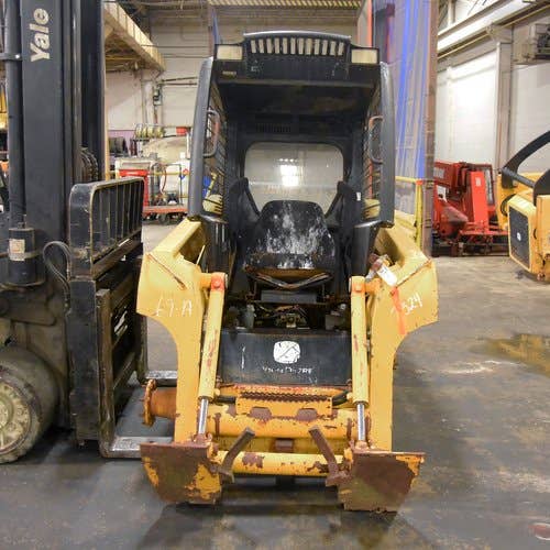 Used John Deere 317 Skid Steer Loader parts.