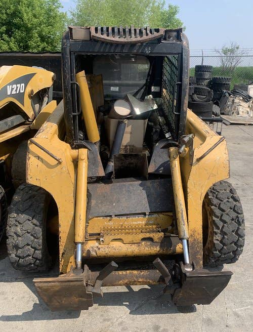 Used John Deere 317 Skid Steer Loader parts.