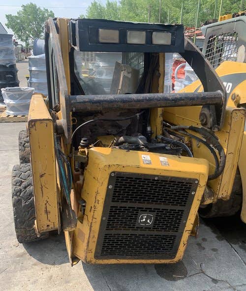 Used John Deere 317 Skid Steer Loader parts.