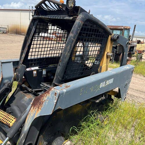 Used John Deere 317 Skid Steer Loader parts.