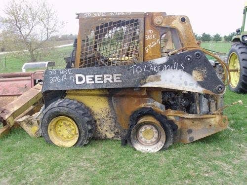 Used John Deere 318 Skid Steer Loader parts.