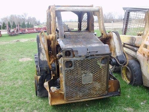 Used John Deere 318 Skid Steer Loader parts.