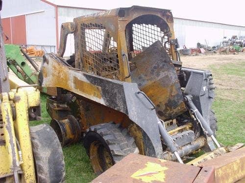 Used John Deere 318 Skid Steer Loader parts.
