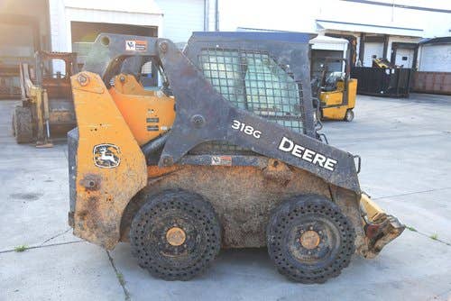 Used John Deere 318G Skid Steer Loader parts.