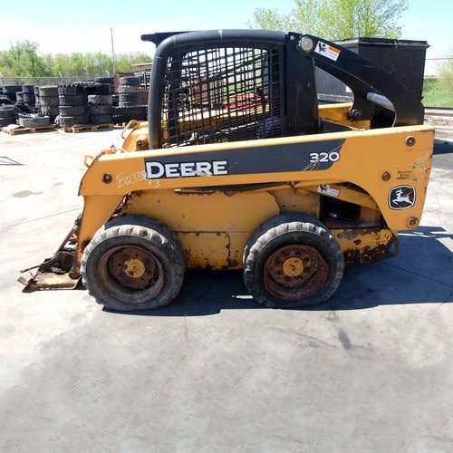 Used John Deere 320 Skid Steer Loader parts.