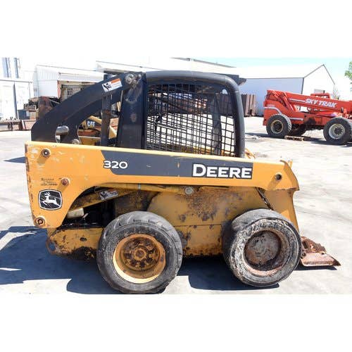 Used John Deere 320 Skid Steer Loader parts.
