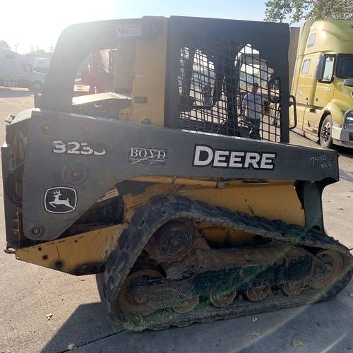 Used John Deere 323D Skid Steer Loader parts.