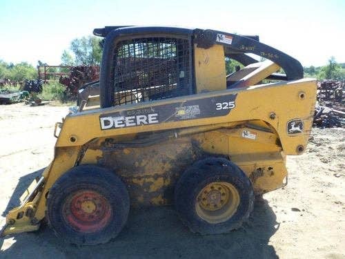 Used John Deere 325 Skid Steer Loader parts.