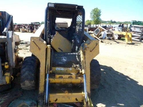 Used John Deere 325 Skid Steer Loader parts.