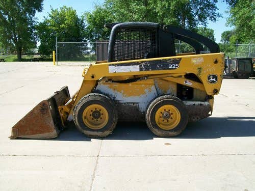 Used John Deere 325 Skid Steer Loader parts.