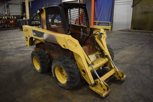 Used John Deere 325 Skid Steer Loader parts.