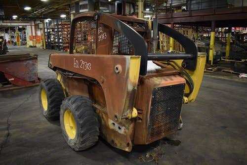 Used John Deere 325 Skid Steer Loader parts.