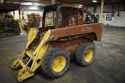 Used John Deere 325 Skid Steer Loader parts.