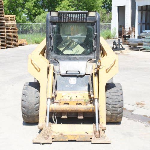 Used John Deere 325 Skid Steer Loader parts.