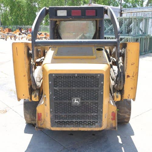 Used John Deere 325 Skid Steer Loader parts.