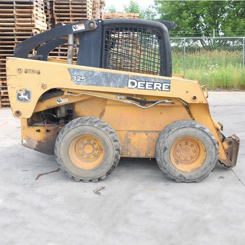 Used John Deere 325 Skid Steer Loader parts.