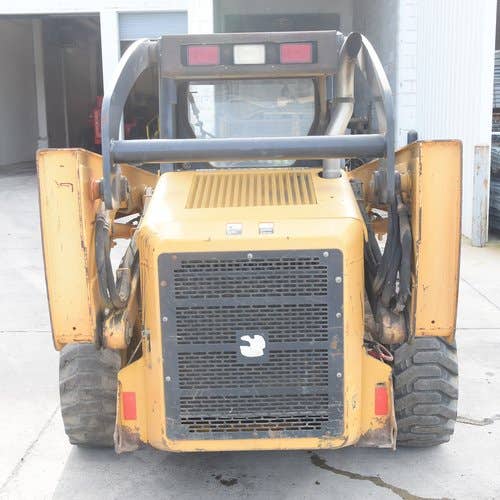 Used John Deere 325 Skid Steer Loader parts.